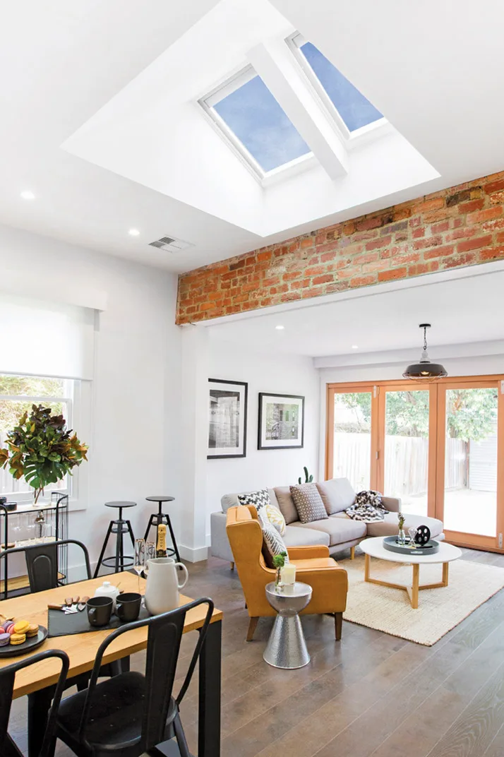 Two roof skylights bringing daylight into a contemporary living room