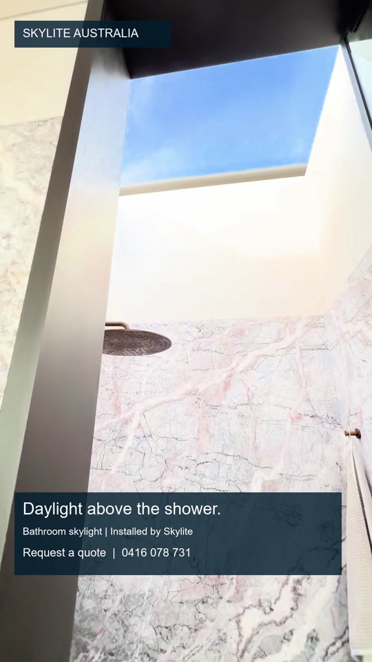 Skylight and lightwell above a stone-lined shower